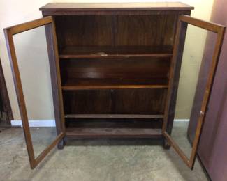 ANTIQUE MISSION OAK DOUBLE DOOR BOOKCASE LEFT GLASS PANEL IS BROKEN AT THE BOTTOM NO SHIPPING PICKUP ONLY