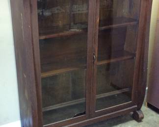 ANTIQUE MISSION OAK DOUBLE DOOR BOOKCASE LEFT GLASS PANEL IS BROKEN AT THE BOTTOM NO SHIPPING PICKUP ONLY