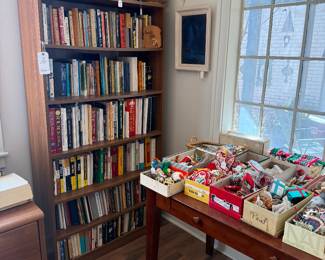 Tons of books and vintage Christmas ornaments