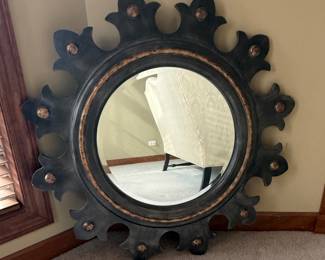 Mid-20th century solid wood sunburst decorative mirror. Quite heavy. Brushed black/gray with gold accents. Measures 40” round, Mirror is 21” round. Almost 1”thick $175