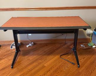 Mid-Century modern industrial desk with power chord. Sleek laminate and metal chord housing in the back to eliminate all those hanging wires. Selling 2 for $150. Great shape! 48” W x 24” D x 29” H 2 for $150 or 1 for $75
