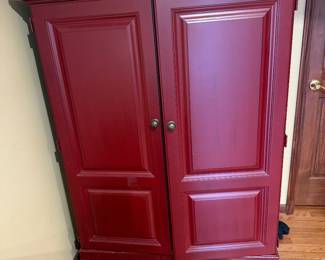 Hooker Furniture Co. red wood armoire with paneled doors. Heavy. 46” W x 24 1/2” D x 61” H $150