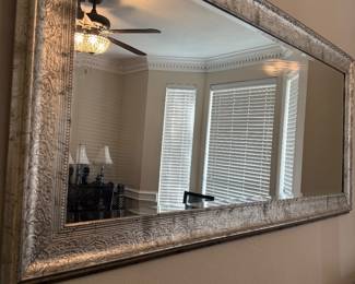 large silver framed mirror