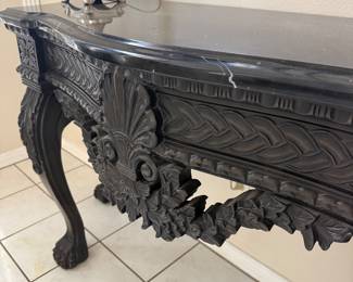 Detail on Carved wood entry table