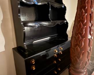 black dresser with shelf