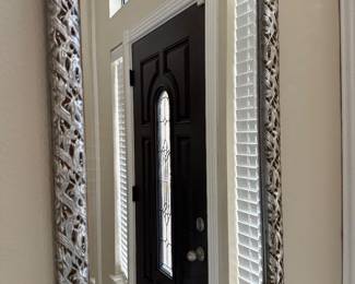 silver framed ornate mirror