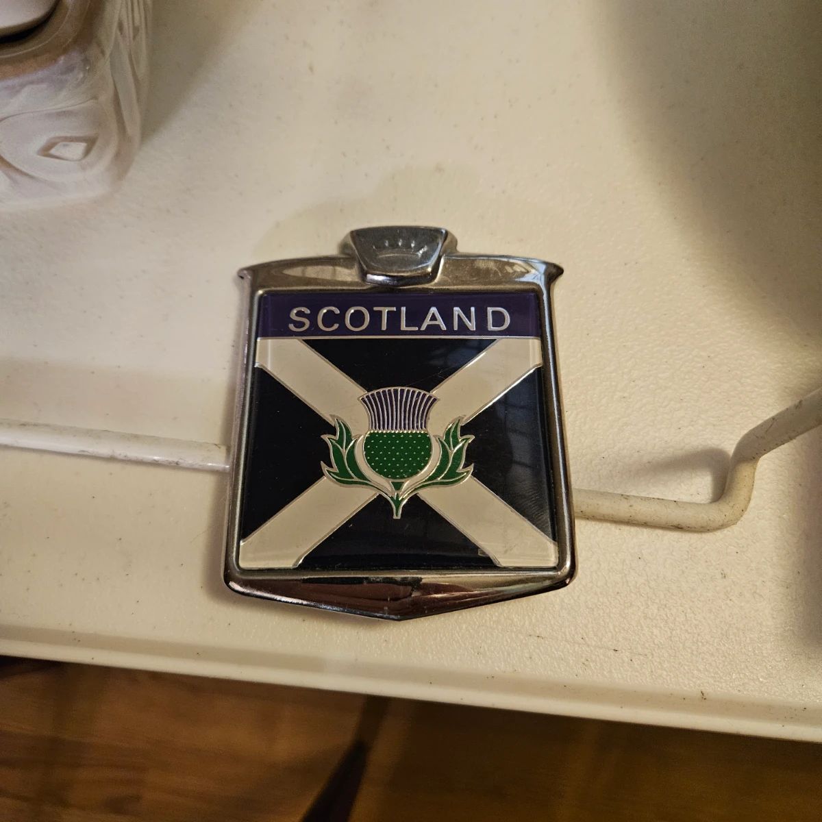 Antique bumper plaque