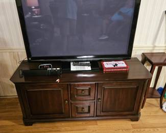 2 large flat screen tv one small plus 2 stands