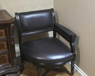 Leather corner armchair on casters