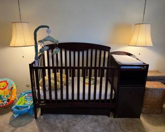 Baby crib w/attached changing table, storage and under storage trundle