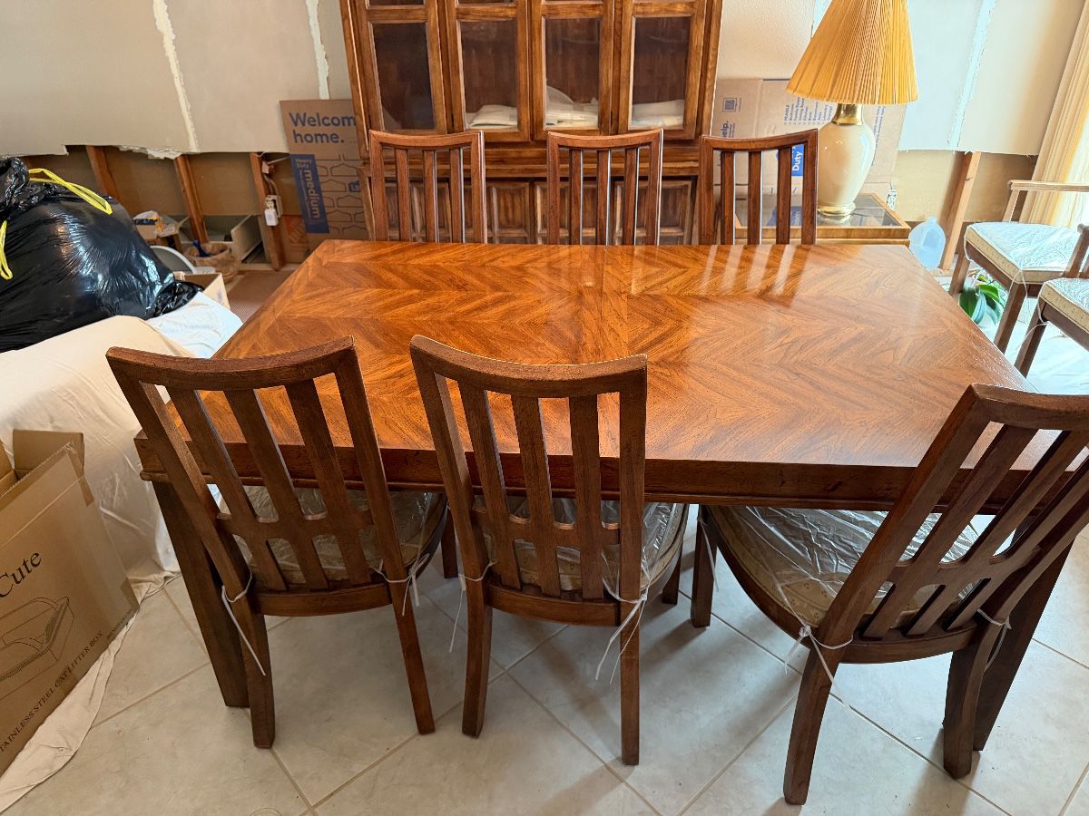 42 by 68 Table, plus 2 Leafs and 10 Chairs