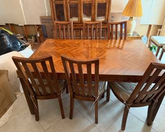 42 by 68 Table, plus 2 Leafs and 10 Chairs