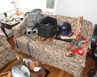 Pair of floral couches, old camera, electronics