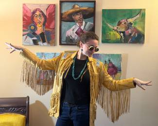 Gorgeous Ren Ellis designs for North Beach Leather. Leather fringe jacket with beaded accents.
