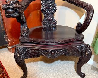 Antique Rosewood dragon chair. Profusely hand carved.