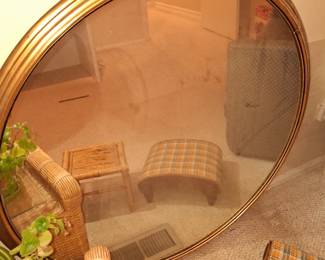 Large round gold trimmed mirror