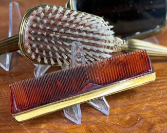 This lot features an antique bronze vanity set with two of the items marked by manufacturer S & B Saart Brothers out of Attelboro, Mass.