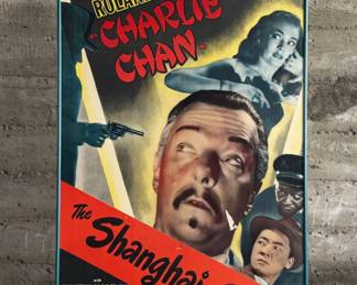 This lot features an original movie poster of The Shanghai Chest circa 1948. Measures in frame, 38.75” H x 25” W.