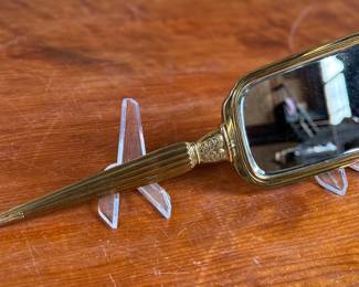 This lot features an antique bronze vanity set with two of the items marked by manufacturer S & B Saart Brothers out of Attelboro, Mass.