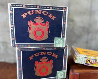 This lot features a curated collection of vintage cigar boxes in various conditions.