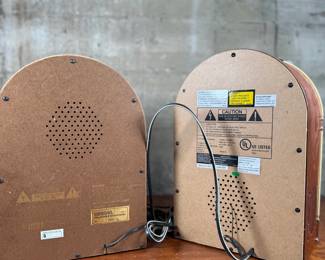 This lot features a pair of jukebox-style radios, likely considered vintage now! They measure, 15” H and come untested.