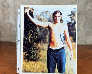 This lot features a signed photograph of actor Joaquin Phoenix and comes with a certificate of authenticity.