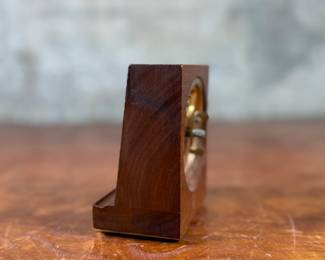 This lot features an Art Deco style 8-day clock manufactured by Seth Thomas in good working condition.