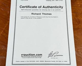 This lot features a signed photograph of actor Richard Thomas as John-boy from the Walton’s with a certificate of authenticity. 