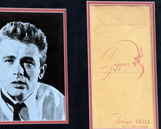 This lot features a professionally framed photo of James Dean along with a signed menu from the Terrace Grill. Accompanied with a certificate of authenticity. Measures in frame, 19” H x 23.5” W.