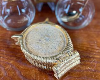 This lot features a vintage owl themed set with two jars manufactured by Ted Arnold Ltd., and a set of four (4) "owl" coasters.