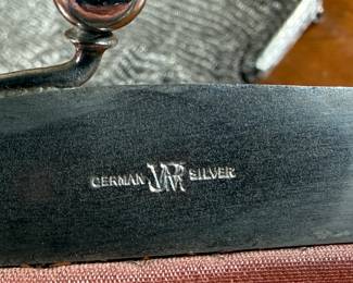 This lot features a pair of antique German silver mesh flapper purses from the late 19th century in good condition. One is marked, "German Silver" as shown in photos.