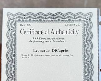 This lot features a signed photograph by actor Leonardo DiCaprio and comes with a certificate of authenticity.
