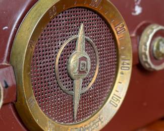 This lot features a vintage Crosley bakelite radio, specifically a "dashboard" model circa 1950s. Comes untested.
