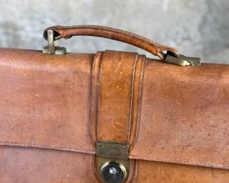 Proceeds from this lot will be donated to non-profit Salem Dogs in Marion County, Oregon. This lot features an antique leather briefcase manufactured by Renwick out of Canada. Salem Dogs focus is on helping special needs dogs when their people experience extreme circumstances. Owner death, hospice, and nursing/assisted living situations are some examples that trigger the need for a new home. In addition, some people find themselves unable to afford medical bills and opt to have their dog euthanized. In those cases, Salem Dogs is often contacted and has either taken in the dog or helped the owner financially. While most of their work is in the Salem, Oregon area, this charity has helped dogs in multiple areas around North America.