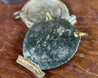 This lot features a vintage owl themed set with two jars manufactured by Ted Arnold Ltd., and a set of four (4) "owl" coasters.