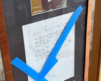 This lot features a professionally framed signed letter of composer, Erich Korngold on a personal letterhead circa 1954. The frame has some damage and cracks in the glass as shown in photos. Accompanied with a certificate of authenticity. Measures in frame, 26” H x 12” W.