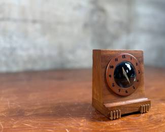 This lot features an Art Deco style 8-day clock manufactured by Seth Thomas in good working condition.