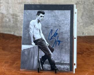 This lot features a signed photograph of actor Colton Haynes and comes with a certificate of authenticity on the verso.