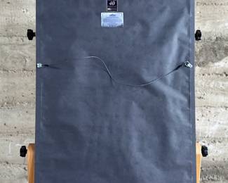 This lot features a professionally framed two-sided letter signed by composer, Ralph Vaughan Williams along with a LP by composer Sir John Barbirolli. Measures in frame, 31” H x 21.5” W.