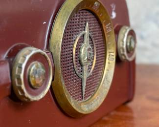 This lot features a vintage Crosley bakelite radio, specifically a "dashboard" model circa 1950s. Comes untested.