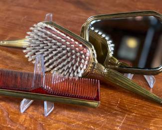 This lot features an antique bronze vanity set with two of the items marked by manufacturer S & B Saart Brothers out of Attelboro, Mass.