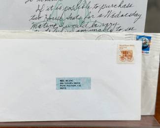 This lot features a signed personal letter from Mel Blanc circa 1988 with the original envelope and accompanied by a certificate of authenticity. 