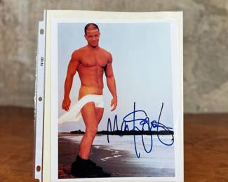 This lot features a signed photograph of actor Mark Wahlberg, also known as “Marky Mark”. Comes with a certificate of authenticity.