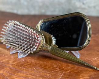 This lot features an antique bronze vanity set with two of the items marked by manufacturer S & B Saart Brothers out of Attelboro, Mass.
