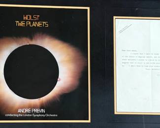This lot features a professionally framed collectible display featuring the 1974 vinyl album of Holst: The Planets, conducted by André Previn with the London Symphony Orchestra. This piece also includes a signed letter by composer, Gustav Holst. Measures in frame, 19” H x 31” W.