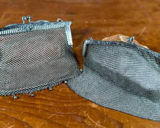 This lot features a pair of antique German silver mesh flapper purses from the late 19th century in good condition. One is marked, "German Silver" as shown in photos.