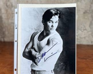 This lot features a signed photograph of actor Dean Cain and comes with a certificate of authenticity.