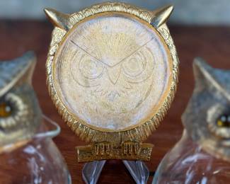 This lot features a vintage owl themed set with two jars manufactured by Ted Arnold Ltd., and a set of four (4) "owl" coasters.