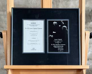 This lot features a professionally framed program signed by composer, Aaron Copland. Measures in frame, 15” H x 17.5” W.