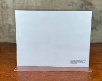 This lot features a signed photograph of actor Heath Ledger, obtained in person on film location of Dark Knight in Chicago, Illinois.